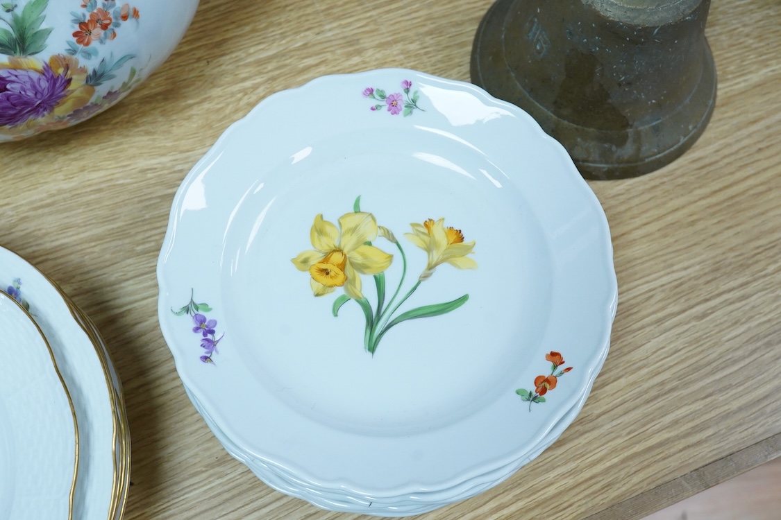 A collection of Meissen porcelain to include floral side plates and a German floral encrusted pot, 18cm high